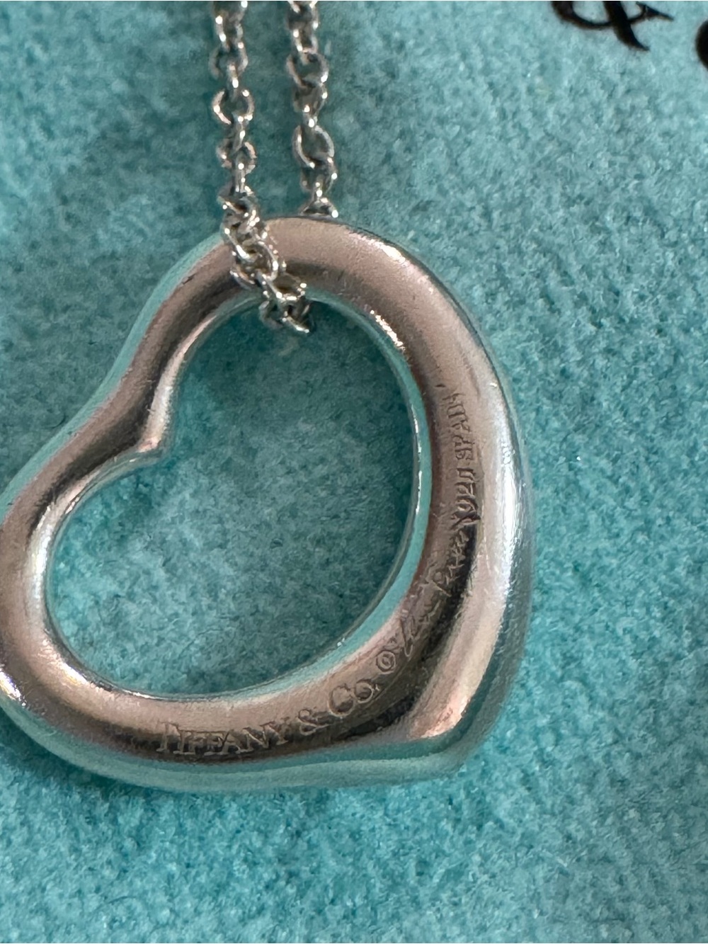 Tiffany & Co. Open Heart Pendant Necklace in steering silver . W /pouch , box .